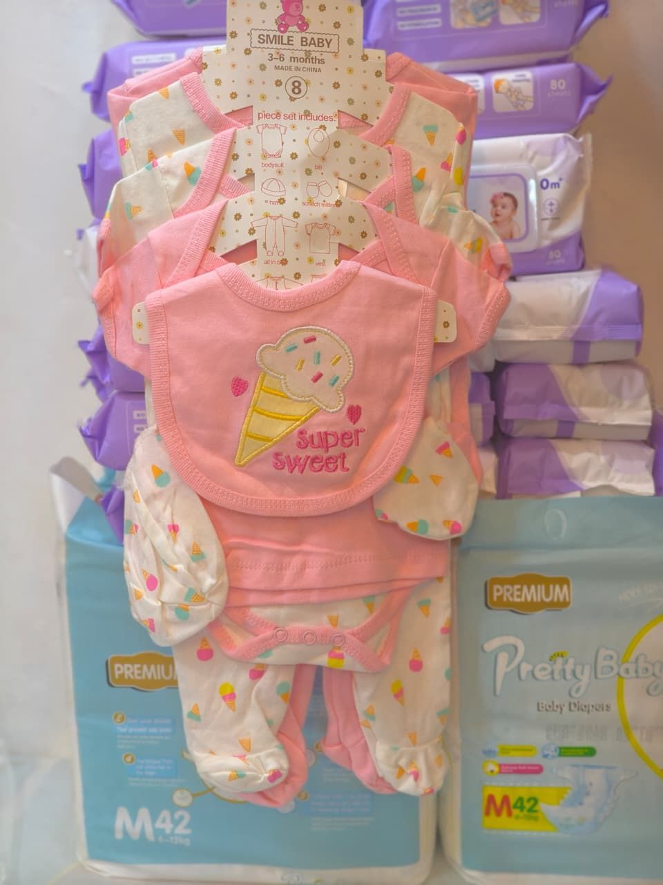 option 7, 8-Piece Set Onesie, Hat, Mitts, Bib, & More.jpeg