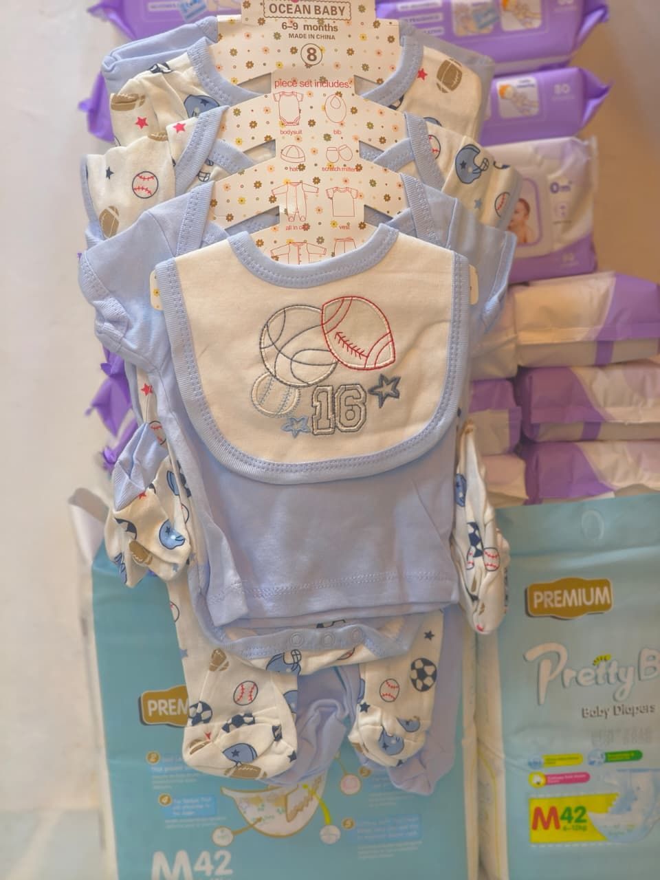 option 8, 8-Piece Set Onesie, Hat, Mitts, Bib, & More.jpeg